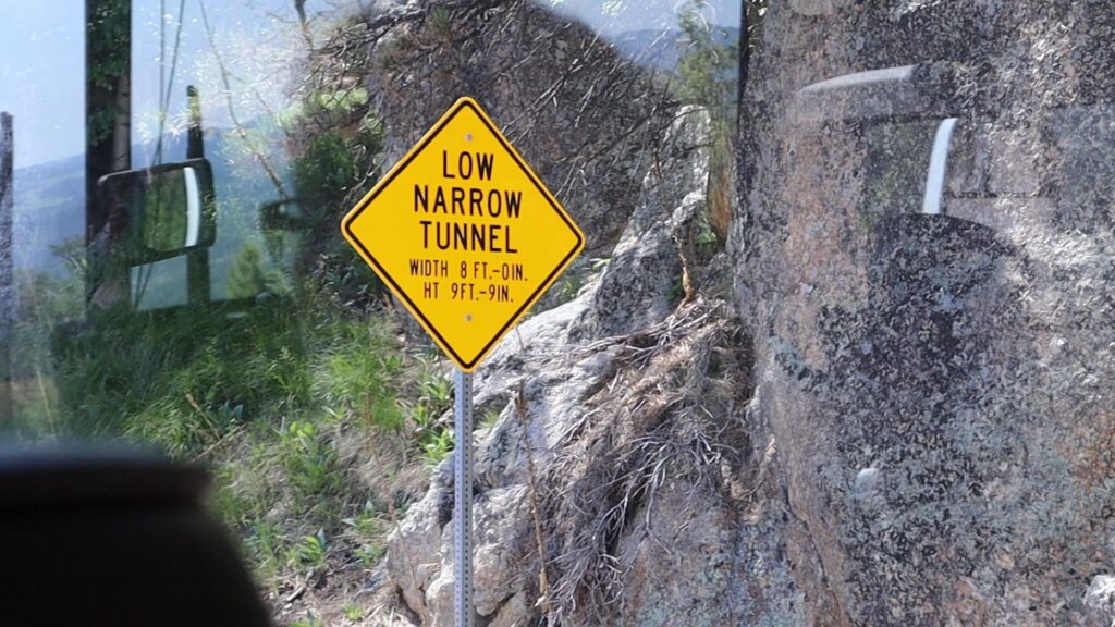 Needles highway narrow tunnel sign