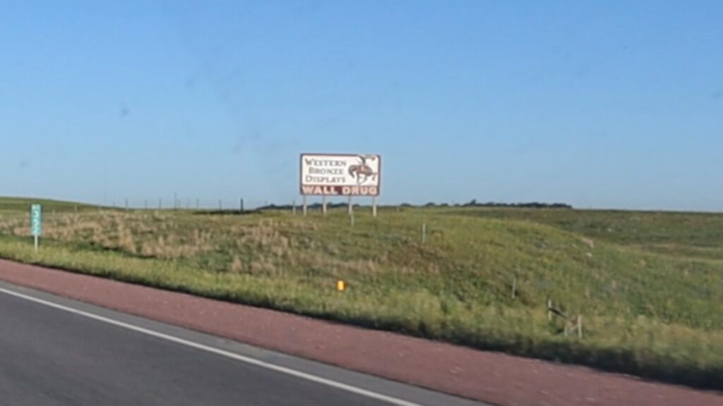 wall drug south dakota billboard on the side of the highway
